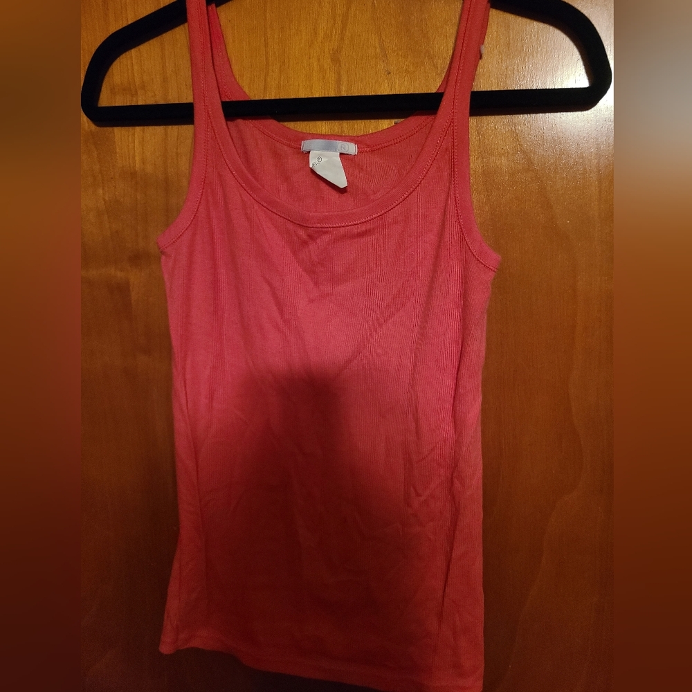 Gently worn ribbed coral tank top.  Universal color-good on all skin tones.
